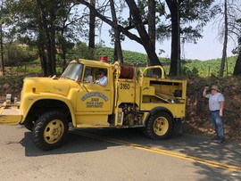 Fred Schweiger's yellow fire truck working on Spring Mountain Road